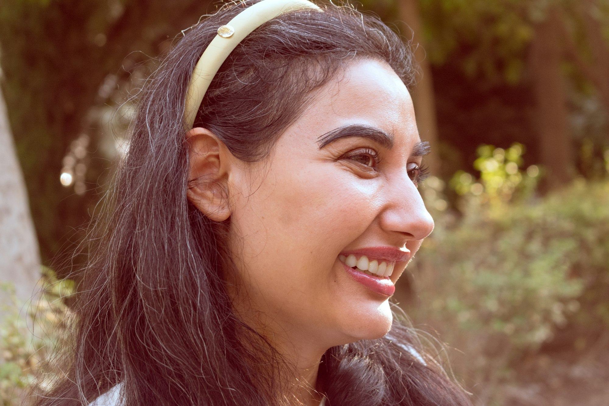Woman smiling outdoors